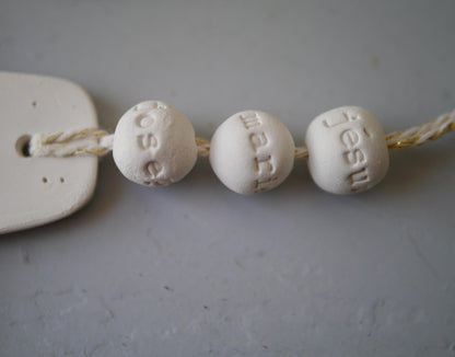 croix céramique murale